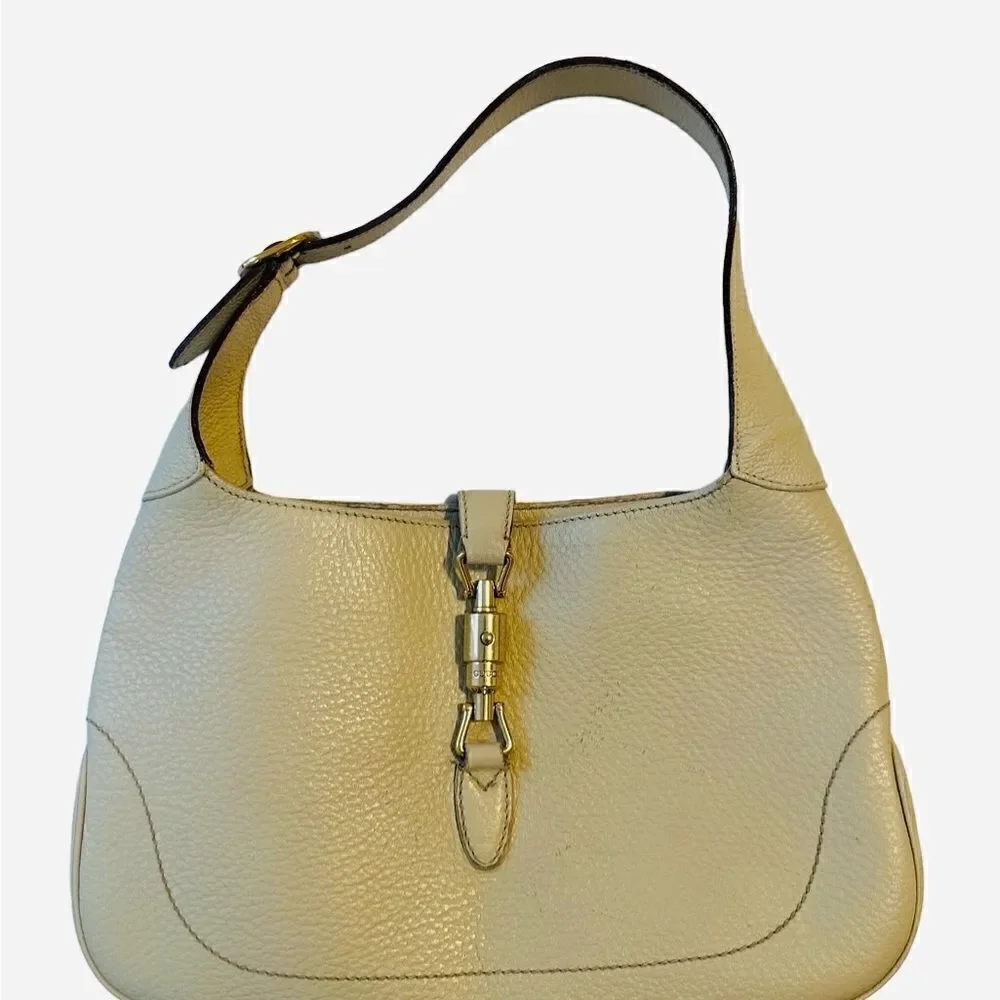Gucci beiges leather Jackie bag with silver piston lock